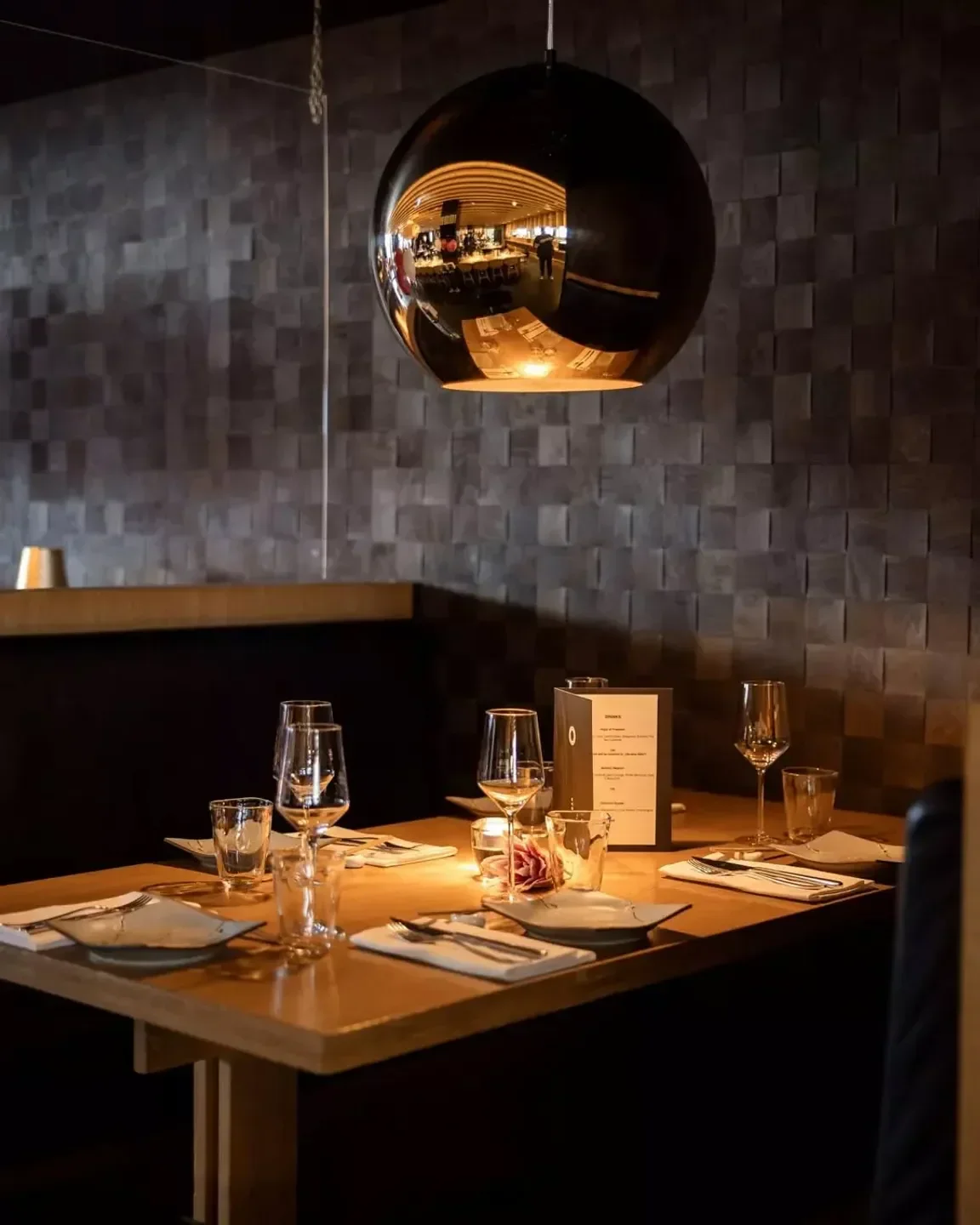 Cozy dining table at Izakaya restaurant in Ibiza with elegant lighting and decor