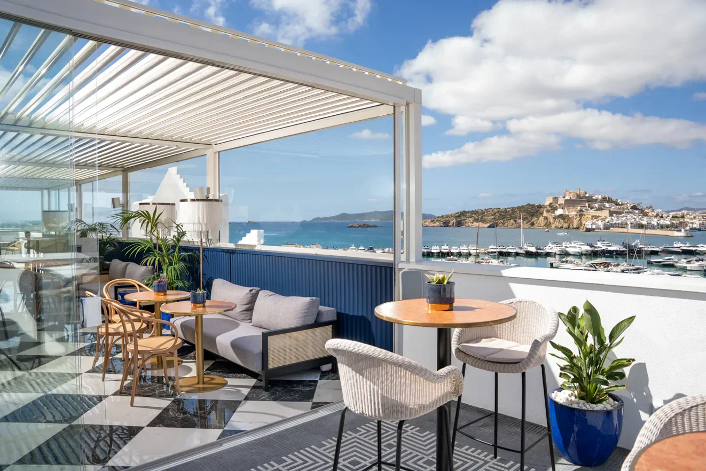 OD Sky Bar Ibiza, stylish restaurant terrace with sea views and a beautiful cityscape.